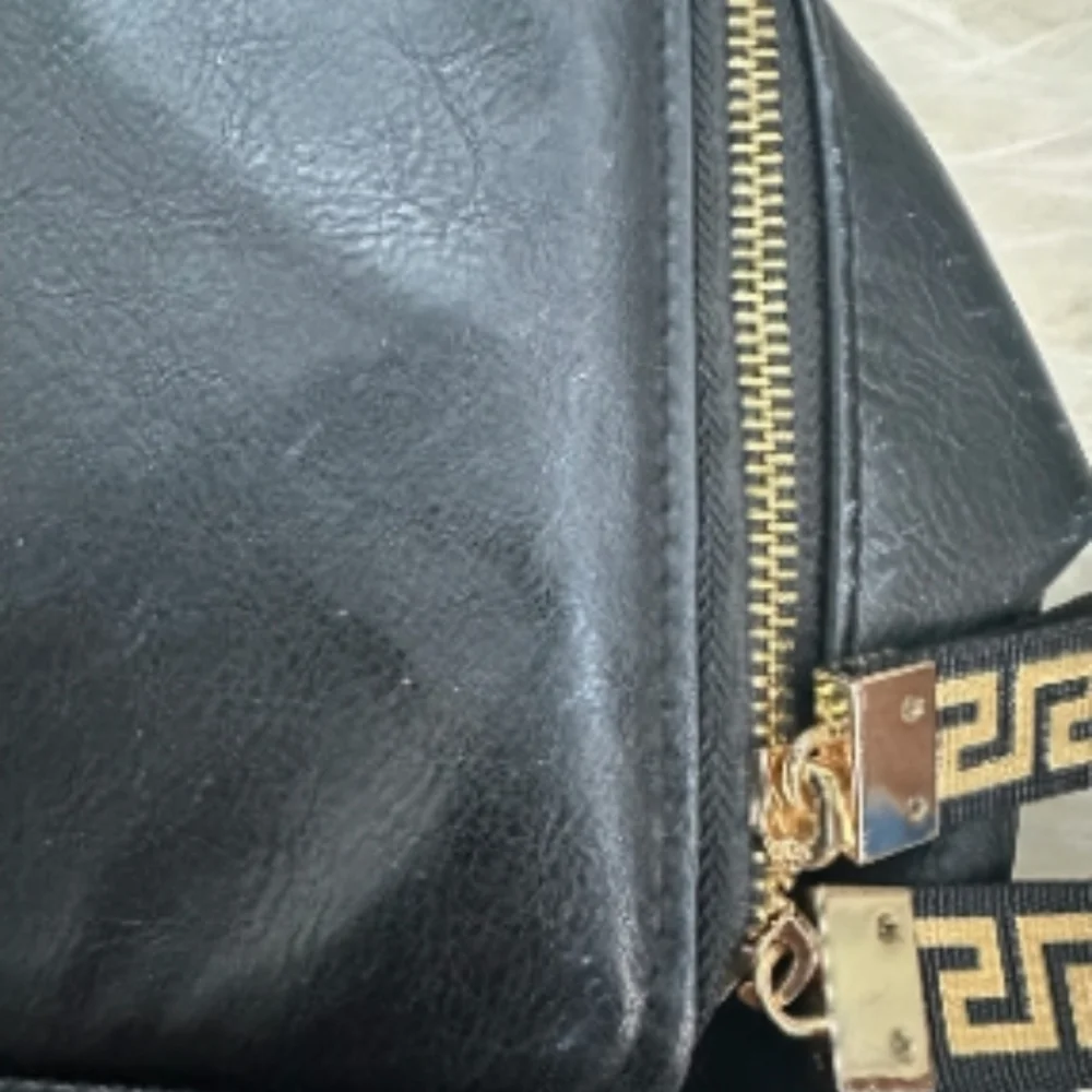 Versace Black Backpack with Gold Accents - Picture 2 of 11